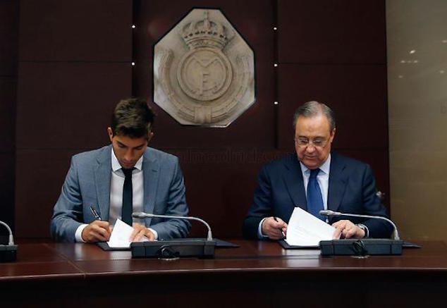 Lucas Silva signs a five year contract alongside Real Madrid's president Florentino Perez